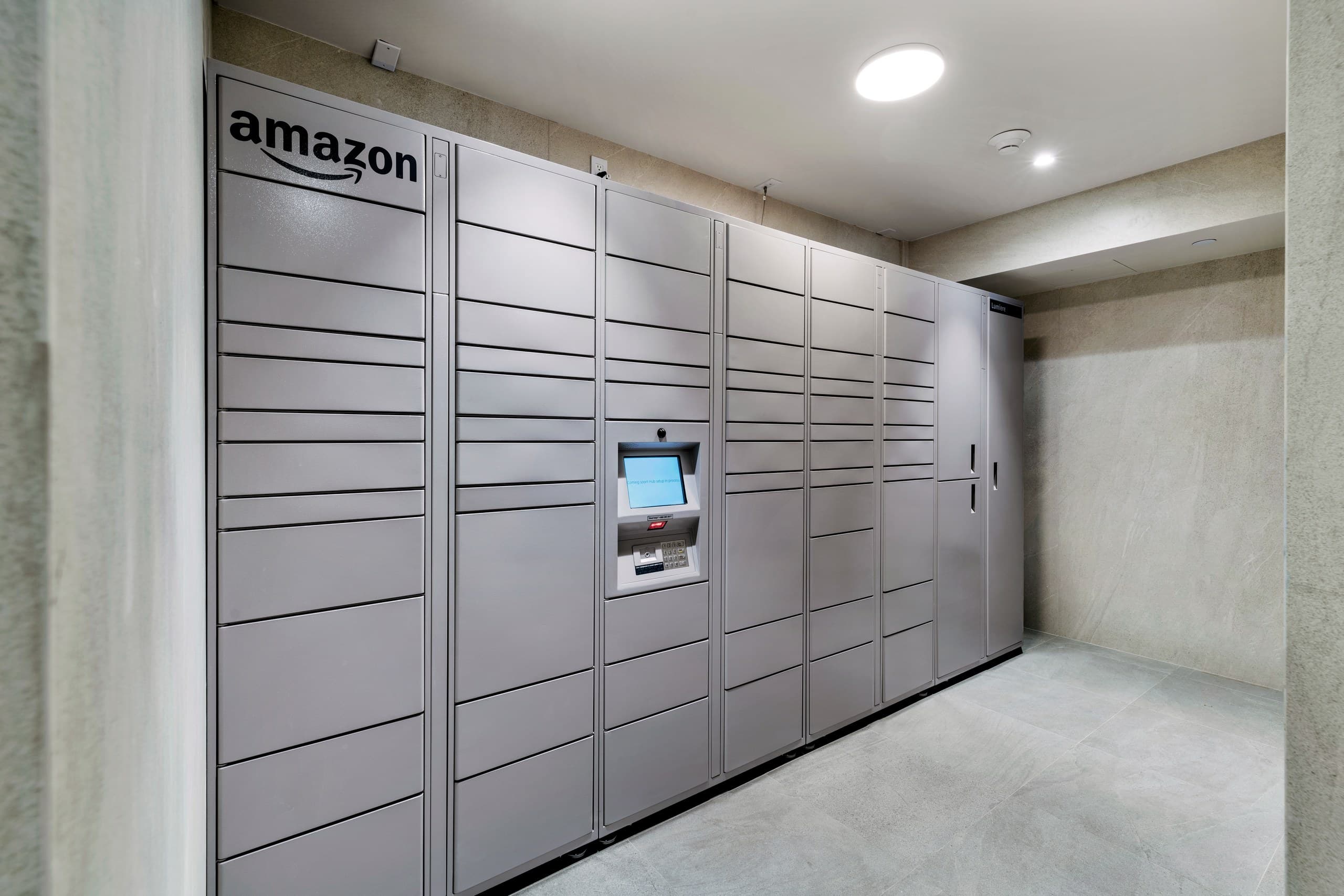 Amazon Hub package lockers in the Lumiere at Malcolm parcel room