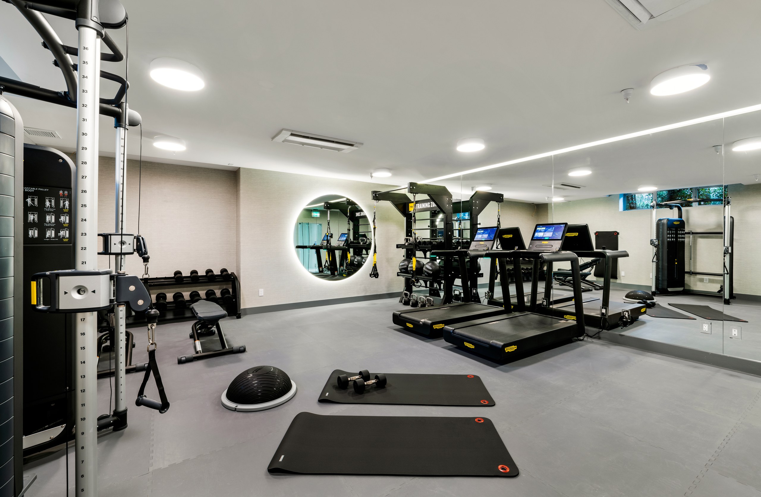 Private fitness studio with Technogym equipment at Lumiere at Malcolm